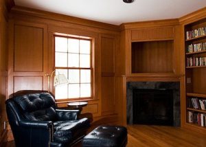 Arts & Crafts style library with fireplace