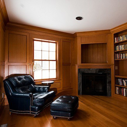 Arts & Crafts style library with fireplace